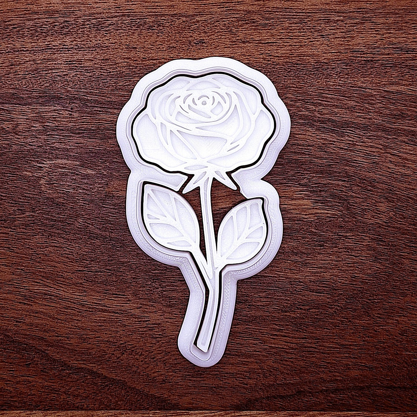 Elegant rose-shaped cookie cutter in eco-friendly plastic, perfect for floral cookies, spring baking, or romantic dessert decorating.