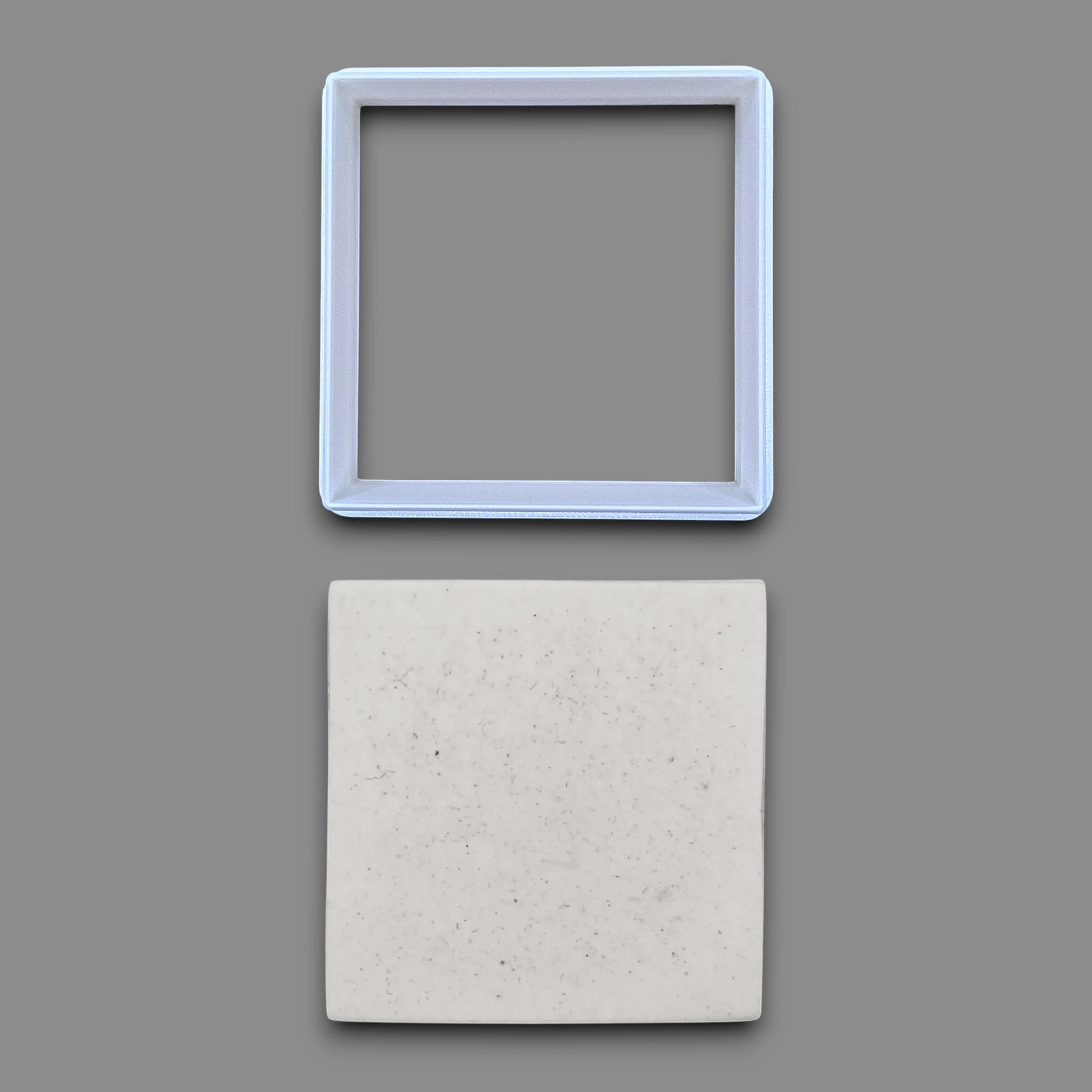 Square cookie cutter alongside a dough cutout, perfect for fondant, dough, clay, ceramics and fondant.