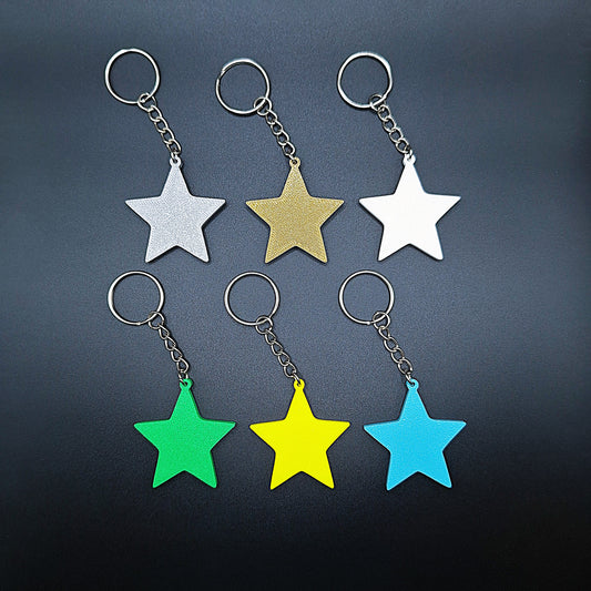 Front view of six star keychains in assorted colors, handmade from biodegradable PLA plastic, perfect for gifts, key rings, and party favors.