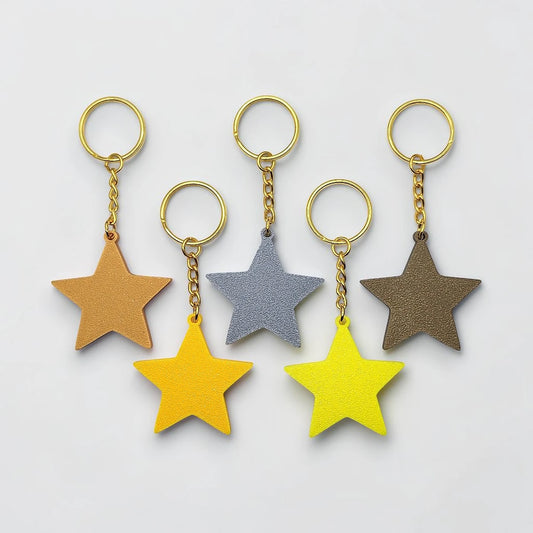 Handmade and customizable star keychains in various colors, made from eco PLA plastic, ideal for classroom prizes, rewards, events, kids, and party favors.