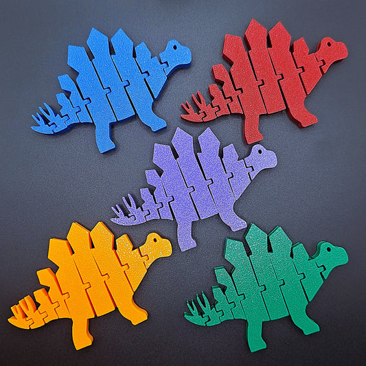 Articulated stegosaurus fidget toys with movable joints, perfect for dinosaur lovers, sensory play, stress relief, and unique gifts.