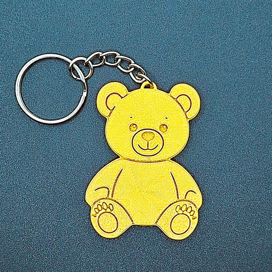 Gold teddy bear keychain—adorable charm made from compostable PLA plastic, great for gifts, kids’ bags, or cute animal accessory collections.