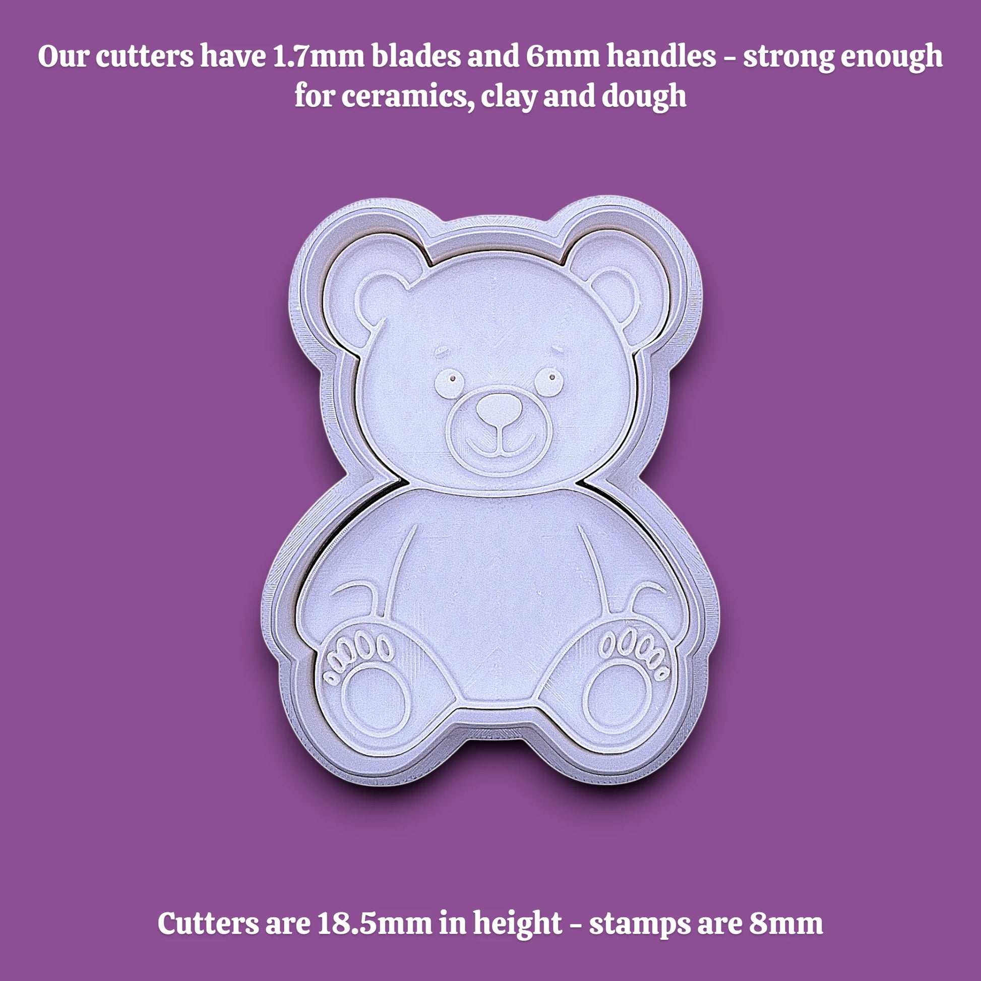 A white plastic teddy bear-shaped cookie cutter shown on a solid gray background, with black text at the top and bottom describing the cutter dimensions and suitability for baking ceramics, clay, and dough.
