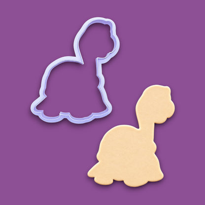 Tortoise cookie cutter alongside a dough cutout, perfect for ocean themed ceramics, clay, soap, biscuits, and fun baking projects.