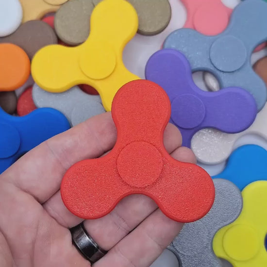 Video demonstrating fidget spinners in various colors, perfect for party favors, birthday gifts and classroom rewards. Customizable in 30 unique colors.