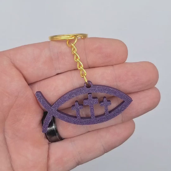 Video showing the Jesus ichthys Christian fish religious keychain, perfect for church party favors, VBS and event giveaways and Easter bag charms.