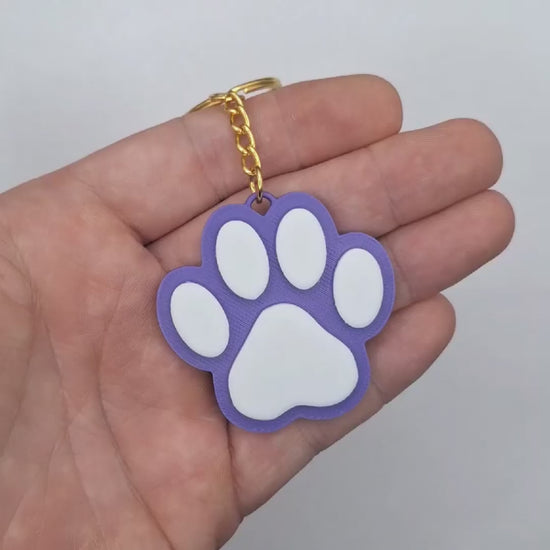 Video showing both sides of the paw print keychain,