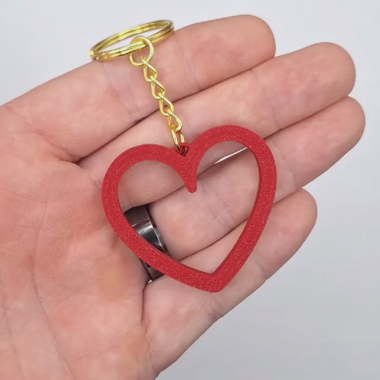 Video showing the heart shaped keychain, perfect for Valentine's Day gifts, wedding party favors, stocking stuffers and class prizes.