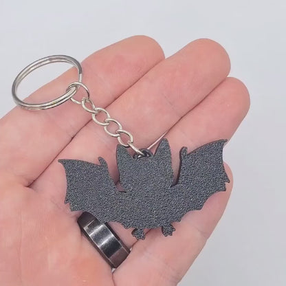 Halloween bat keychain video showing the keychain in various angles, perfect for fall gifts and trick or treats.