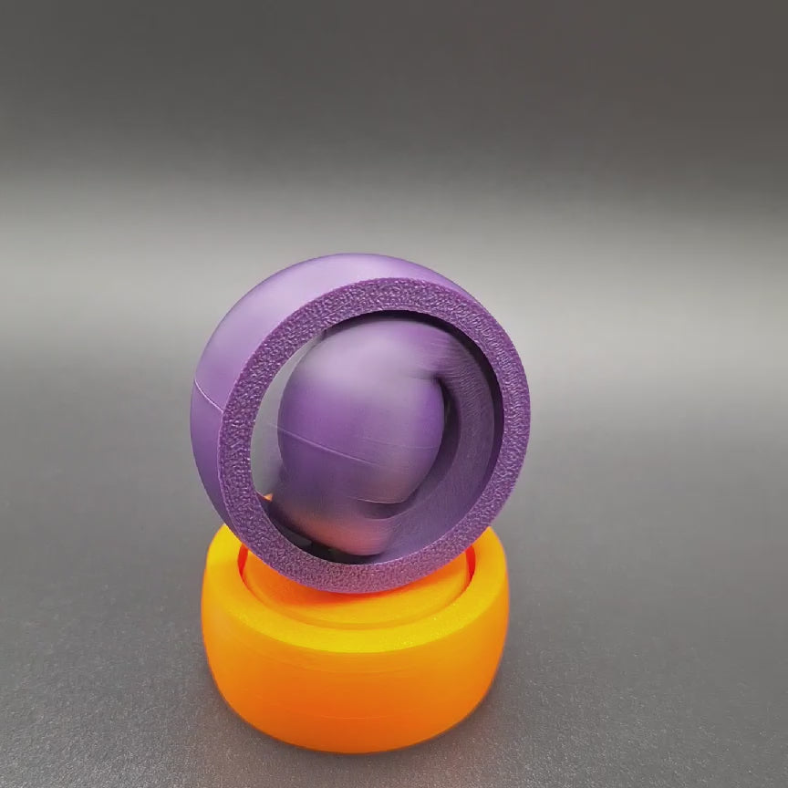 Video of handmade and customizable fidget spinner and gyro spinning