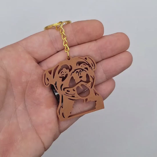 Video showing our pit bull keychain, perfect for pittie owners, pitbull lovers, party favors, and unique bag charms